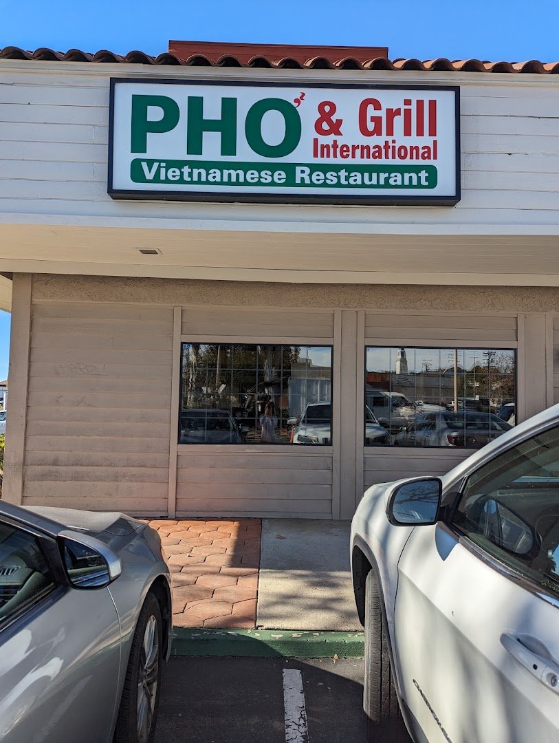 Bowls of pho with herbs and noodles